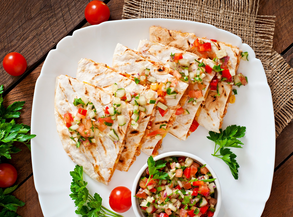 Mexican Quesadilla wrap with chicken, corn and salsa